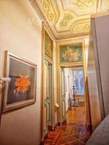 Sfarzose decorazioni allegoriche nella sala delle Allegorie di palazzo Tornielli